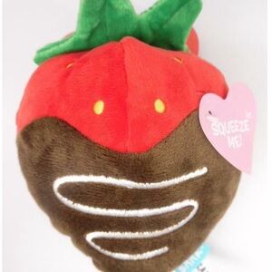 BARK Chocolate Slobber Strawberry Squeeze De-Fluffer Toy for All Dog Sizes